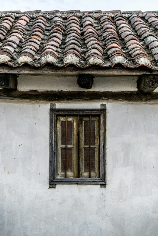 a red fire hydrant sitting in front of a white building, a picture, inspired by Edo Murtić, pexels contest winner, thatched roof, photo of a beautiful window, rectangles, brown