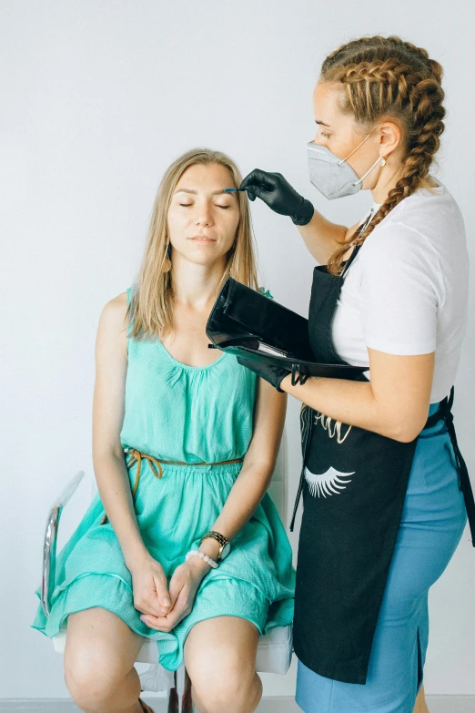 a woman getting her hair done by a hair stylist, a colorized photo, by Aya Goda, trending on unsplash, prosthetic makeup, full body and head shot, anna nikonova aka newmilky, thumbnail