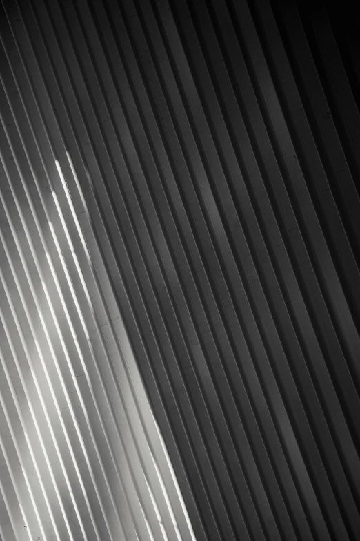 a black and white photo of a window with blinds, inspired by Ryoji Ikeda, unsplash, light and space, santiago calatrava, square lines, gradient, angular metal