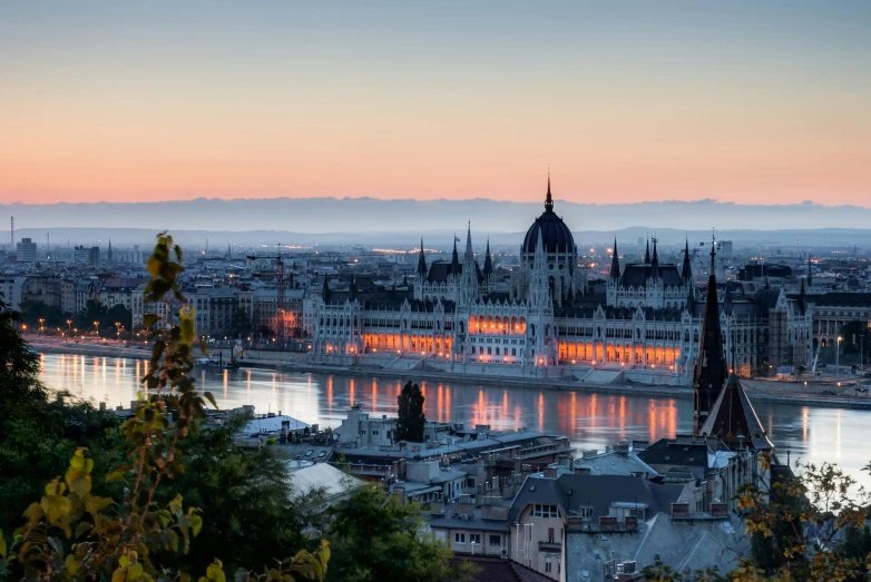 a view of a city with a bridge over the river