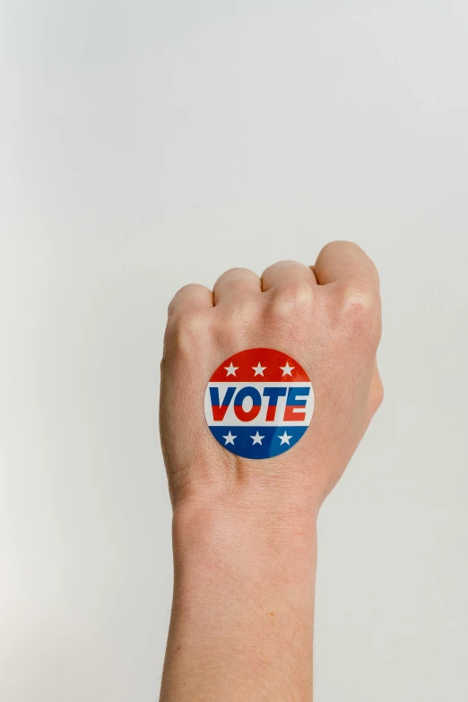 a person's hand with a vote sticker on it, a tattoo, shutterstock, digital art, instagram post, veins, champion, thomas