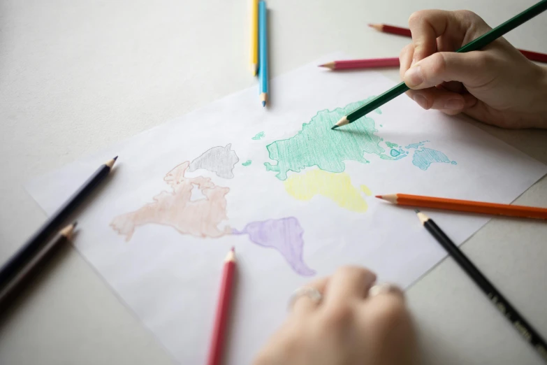 a person drawing a map with colored pencils, a child's drawing, by Arabella Rankin, pexels contest winner, colouring page, several continents, stippling art, thumbnail