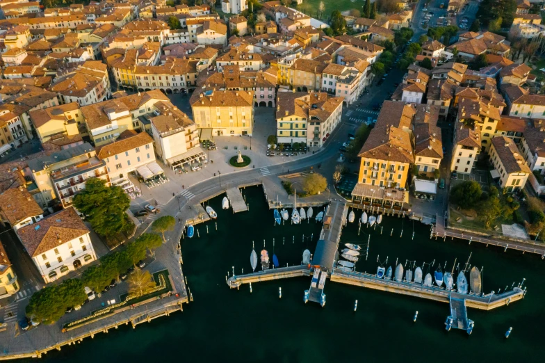 a view of a city from a bird's eye view, by Carlo Martini, pexels contest winner, renaissance, small port village, lake view, thumbnail, square