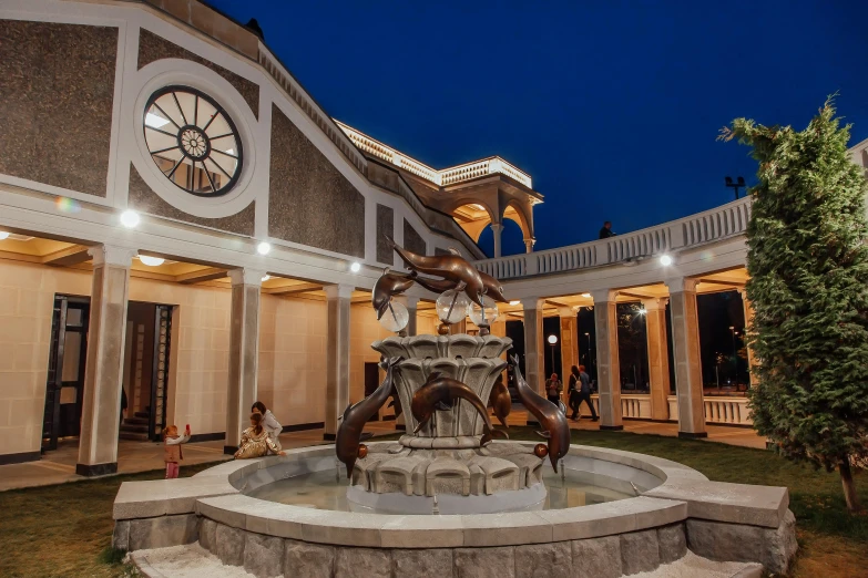 a fountain in front of a building at night, a marble sculpture, pexels contest winner, art nouveau, inter dimensional villa, odeith, sayem reza, golden hour photo