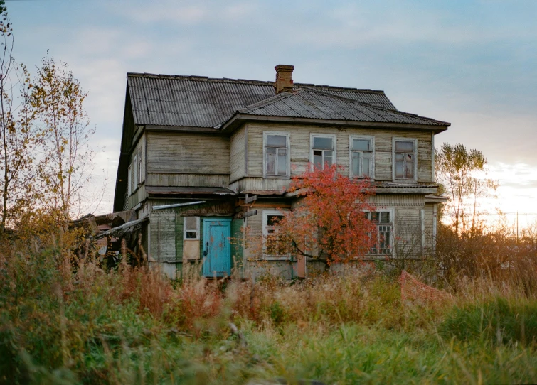 an old house sitting in the middle of a field, an album cover, inspired by Isaac Levitan, pexels contest winner, hyperrealism, autumn overgrowth, soviet suburbs, medium format. soft light, 000 — википедия