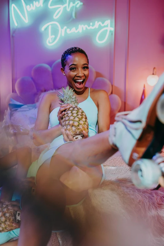 a woman sitting on a bed holding a pineapple, inspired by David LaChapelle, pexels contest winner, teenage vanessa morgan, roller skating, happy toes, performing a music video