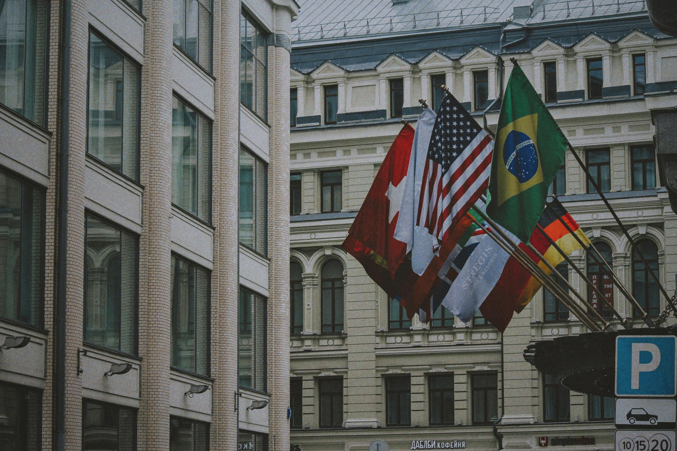 a group of flags hanging from the side of a building, square, mscow, 🚿🗝📝