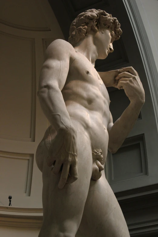 a statue of a man holding a cup, by Michelangelo, accentuated hips, pale skin, sharp focus ”, he is a long boi ”