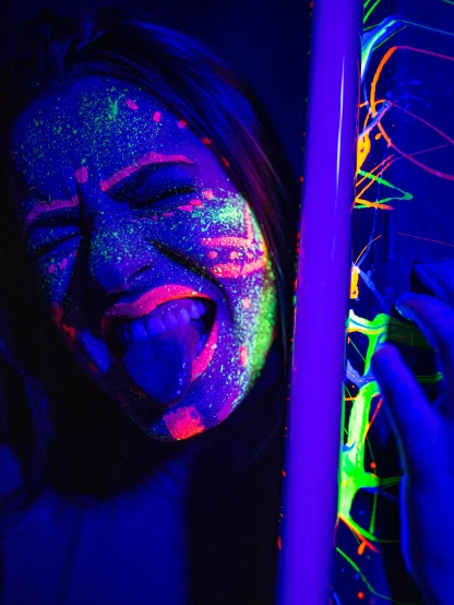 a close up of a person with neon paint on their face, happening, neon standup bar, happy trippy mood, intricate glow accents, (neon colors)