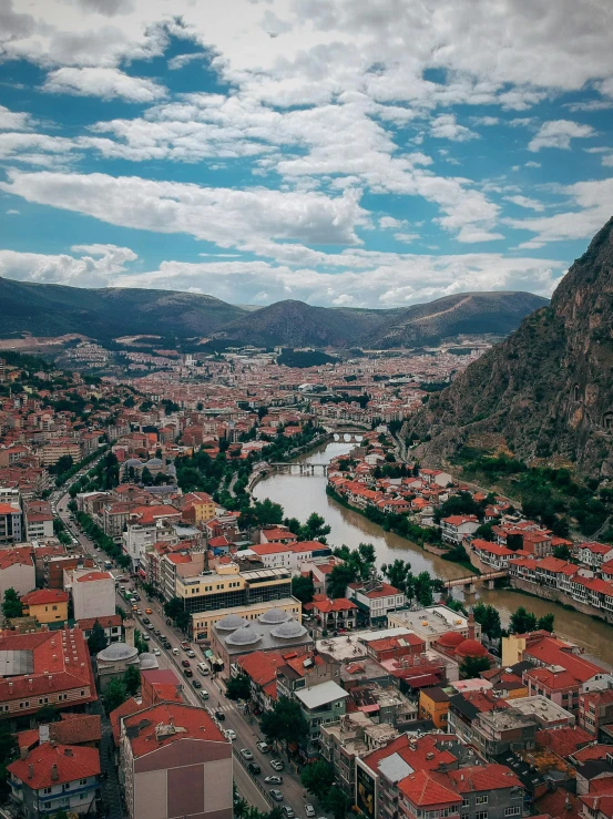 a city with a river and mountains in the background, pexels contest winner, square, spanish, bosnian, high quality print