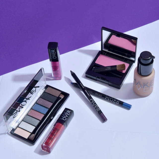 a group of makeup products sitting on top of a table, a picture, photorealism, black and blue and purple scheme, soma, product - view, rectangle