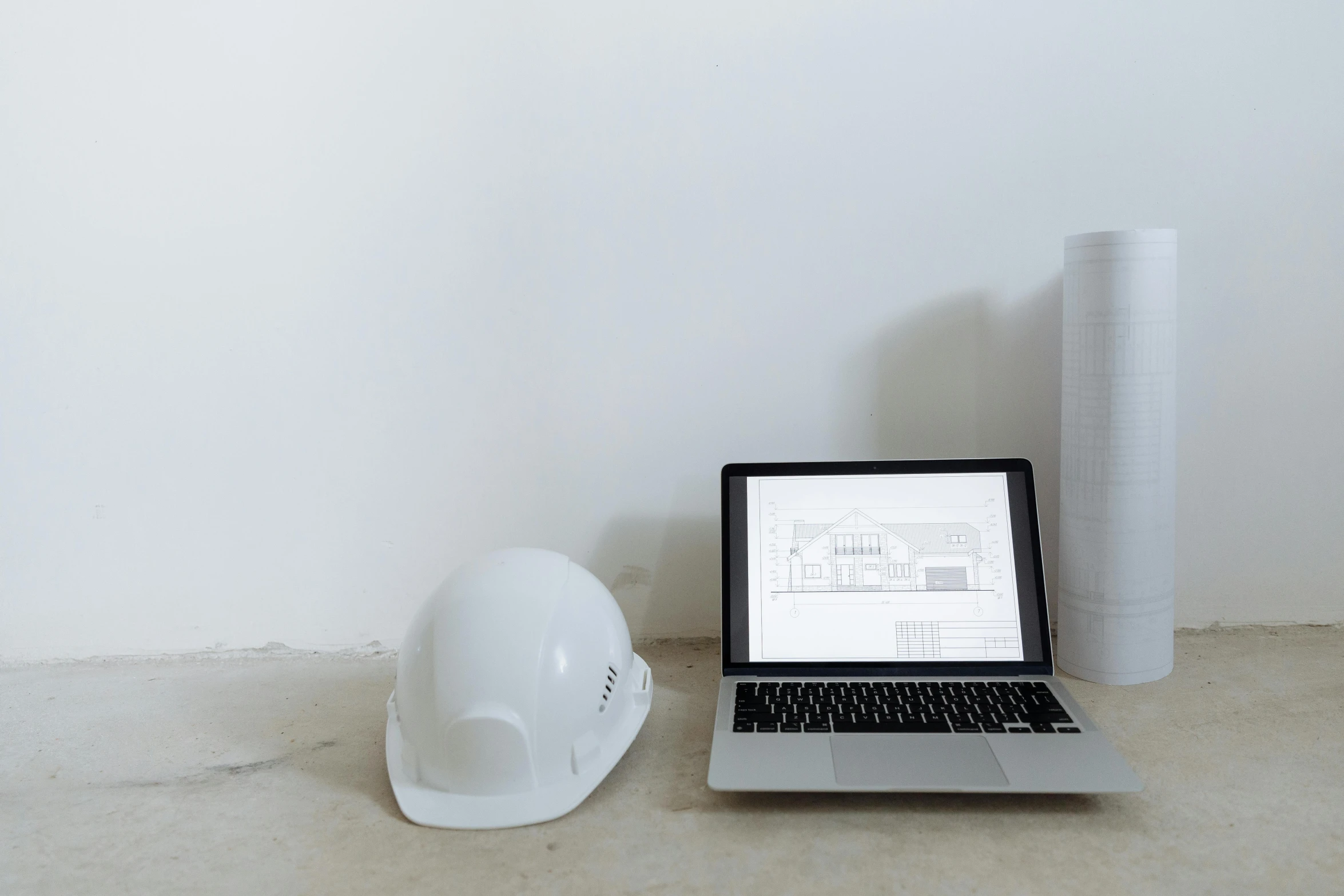 a laptop computer sitting next to a hard hat, a computer rendering, unsplash, white architecture, installation, white, portrait of small