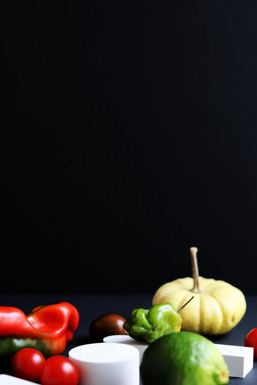 a table topped with assorted fruits and vegetables, a still life, by Alison Geissler, unsplash, realism, black backdrop, square, tomato, autumn