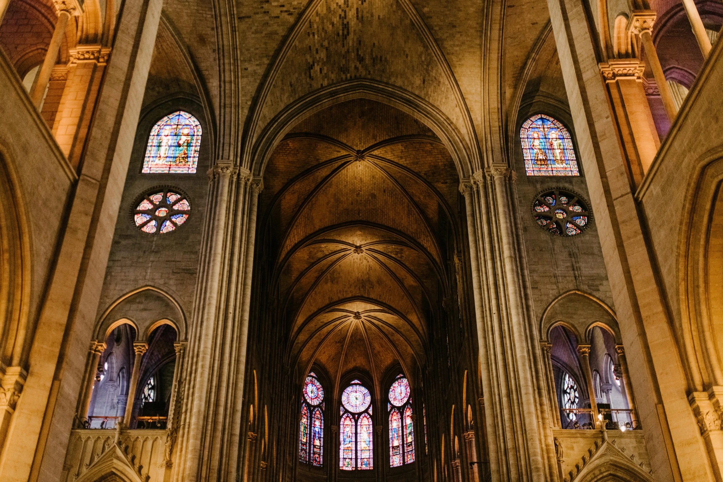 the interior of a cathedral with stained glass windows, an album cover, pexels contest winner, ornate french architecture, buttresses, wide high angle view, youtube thumbnail