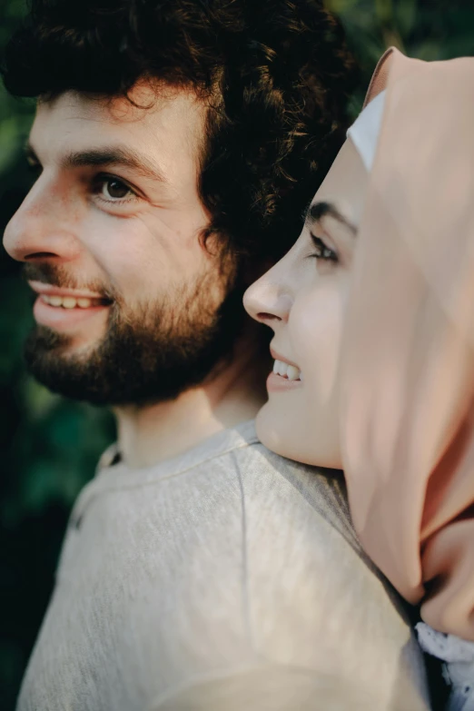 a man and a woman standing next to each other, pexels contest winner, hurufiyya, pale-skinned persian girl, romantic lead, ( ( theatrical ) ), slide show