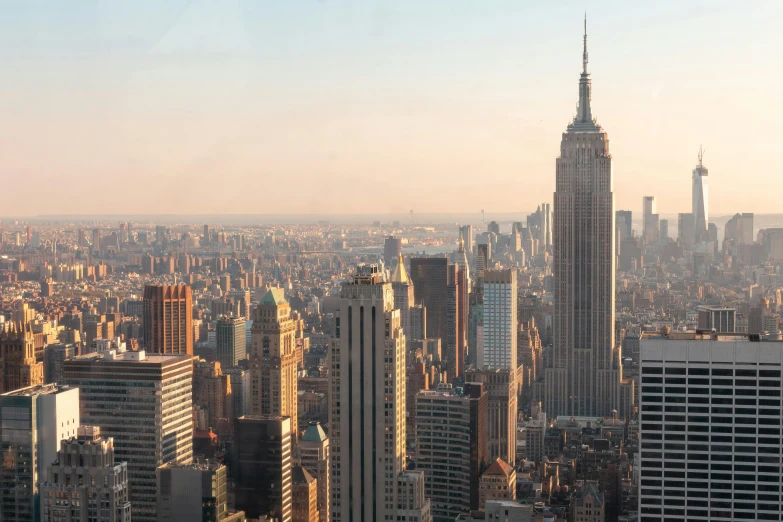 a view of a city from the top of a building, golden hour in manhattan, slide show, 2 0 2 2 photo, fan favorite