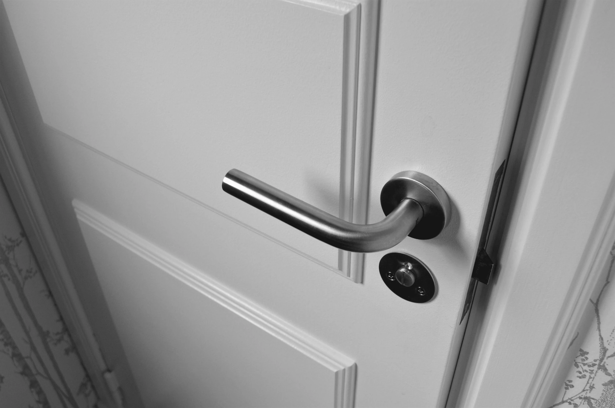 a black and white photo of a door handle, pixabay, modular item, doors to various bedrooms, stainless steal, listing image