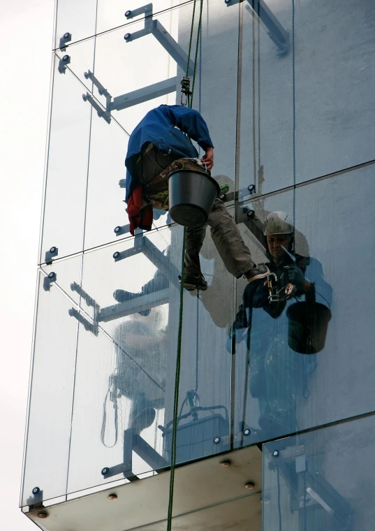 a man climbing up the side of a glass building, painters, square, cleanest image, hires