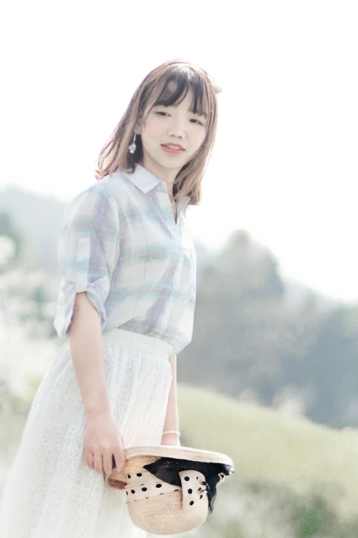 a woman standing in a field holding a basket, instagram, shin hanga, wearing plaid shirt, colors white!!, 千 葉 雄 大, pastel blue