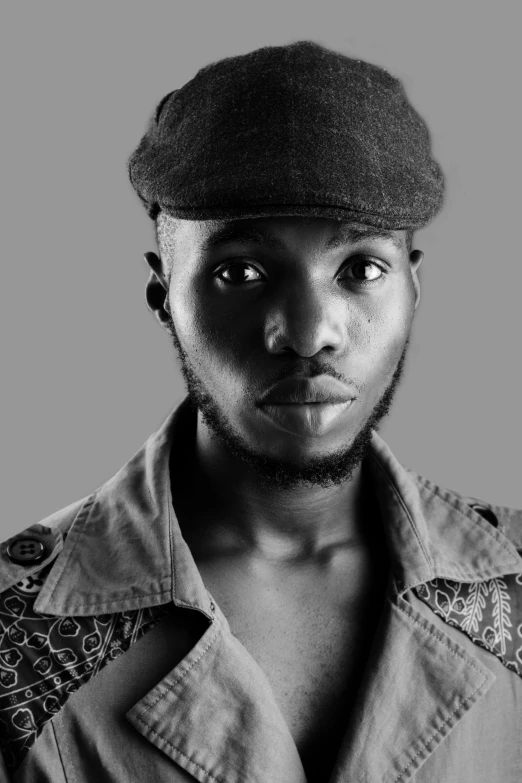 a black and white photo of a man wearing a hat, inspired by Chinwe Chukwuogo-Roy, frank ocean, (beautiful) girl, young man, traditional