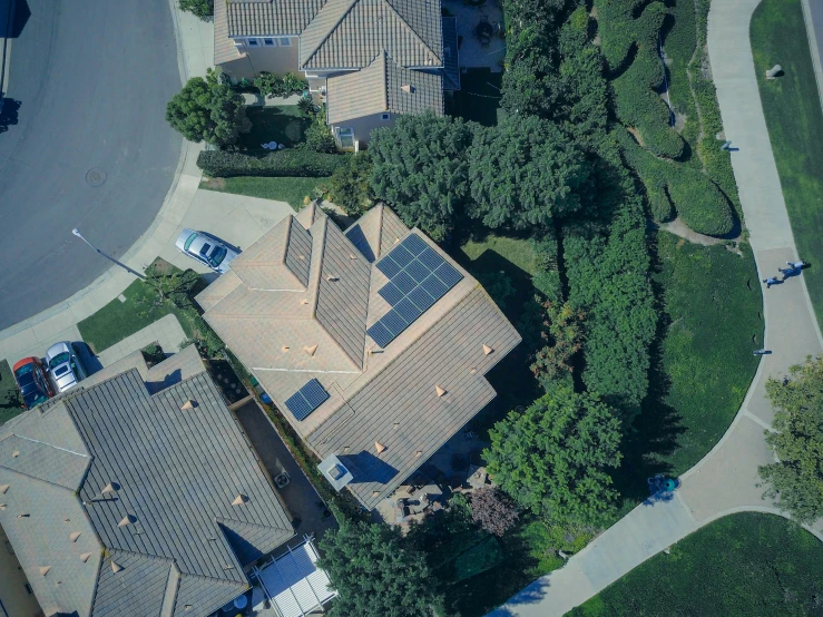 an aerial view of a house with solar panels on the roof, by Ryan Pancoast, pexels contest winner, photorealism, cupertino, 15081959 21121991 01012000 4k, panoramic shot, 3/4 view from below