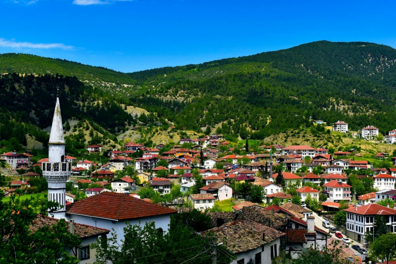 a view of a small town in the mountains, by Muggur, pexels contest winner, renaissance, tiled roofs, meni chatzipanagiotou, profile image, square