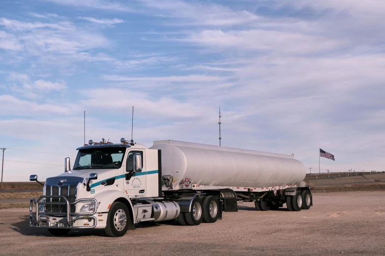 a tanker truck parked on the side of the road, a portrait, unsplash, profile image, fan favorite, tx, hydrogen fuel cell vehicle