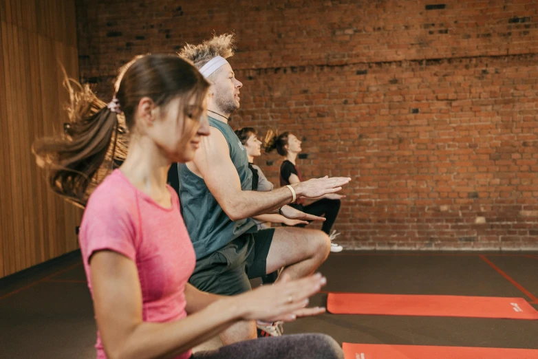 a group of people in a yoga class, by Nina Hamnett, pexels contest winner, sweat, avatar image, lachlan bailey, new balance pop up store