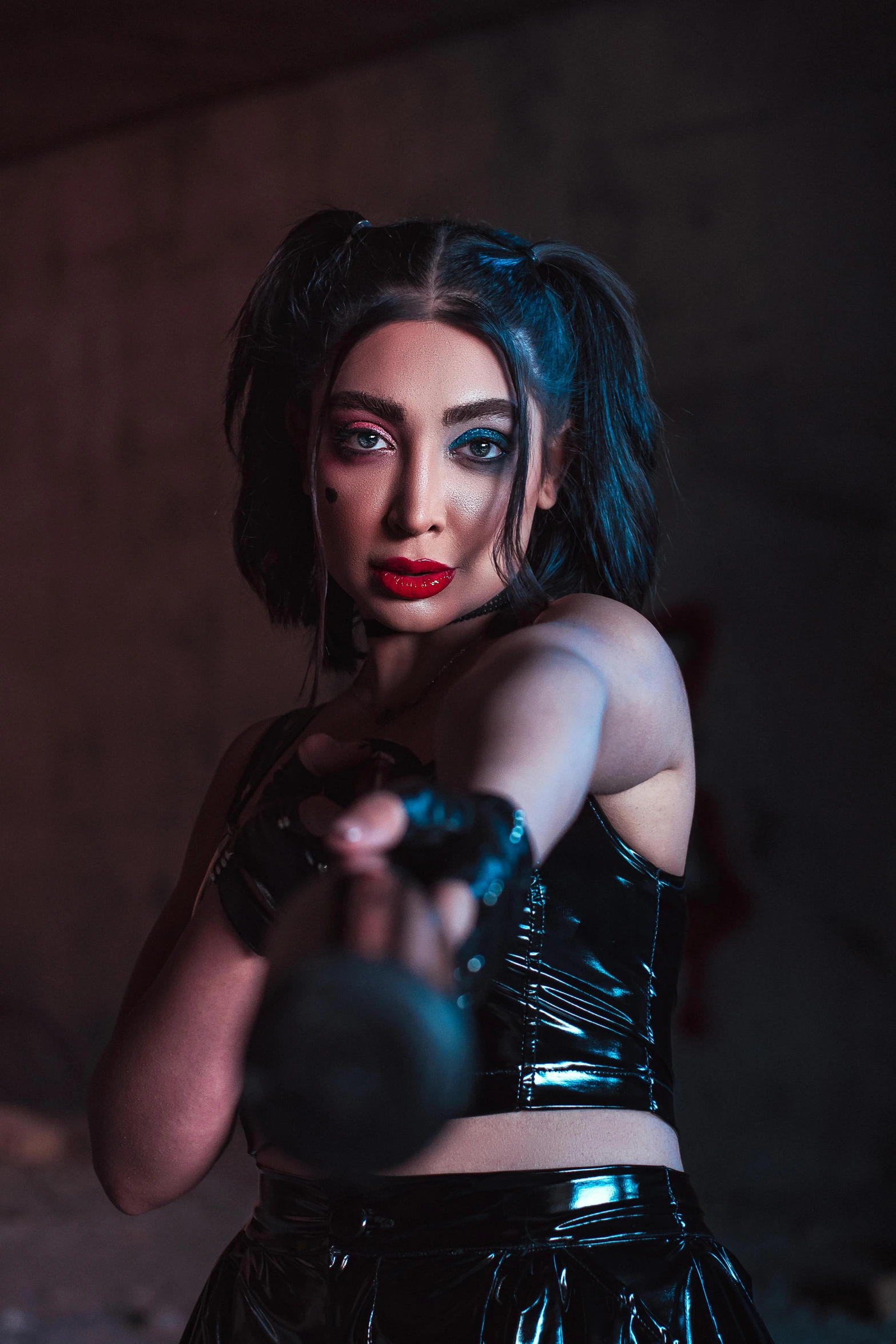 a woman in a black outfit holding a gun, an album cover, inspired by Hedi Xandt, trending on pexels, young beautiful amouranth, angry high moral sexy werewolf, dramatic wielding gun pose, park shin hye as a super villain