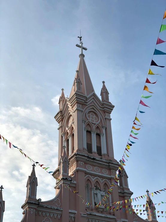 a tall tower with a clock on top of it, unsplash, quito school, ribbon chapel, carnaval de barranquilla, profile image, holy cross