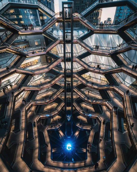 an image of the inside of a building, an album cover, inspired by Zaha Hadid, unsplash contest winner, fire escapes, hexadome, in the middle of new york, library of babel