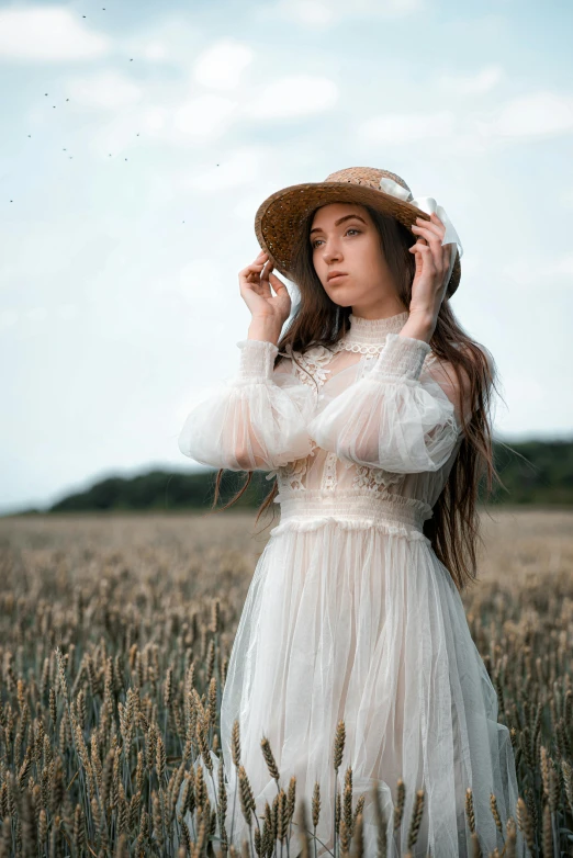 a woman in a white dress and hat standing in a wheat field, inspired by Elsa Bleda, pexels contest winner, renaissance, young woman with long dark hair, very pale skin, 5 0 0 px models, translucent skin