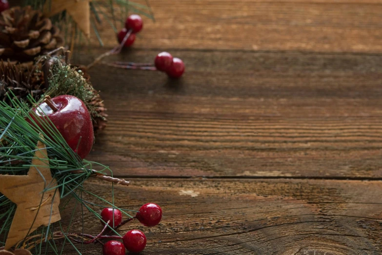 a wooden table topped with apples and pine cones, pexels contest winner, hurufiyya, accents of red, background image, blank, cherry