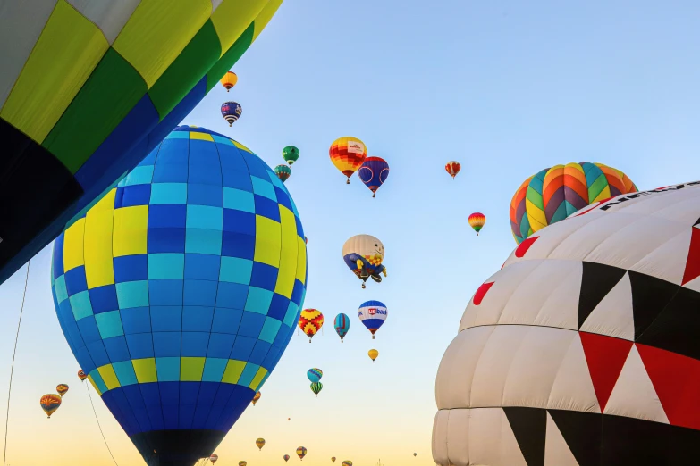 a group of colorful hot air balloons flying in the sky, a photo, by Winona Nelson, pexels contest winner, renaissance, rafeal albuquerque, sprawling, thumbnail, cover shot