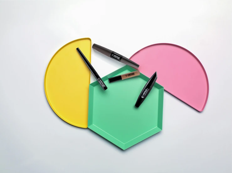 a pair of scissors sitting on top of a piece of paper, pastel makeup, solid coloured shapes, hexagonal shaped, draw with wacom tablet