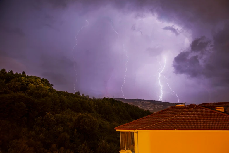 a lightning bolt hitting through a cloudy sky, by Kristian Zahrtmann, pexels contest winner, light breaks through the roofs, distant mountains lights photo, multiple stories, lightening tree