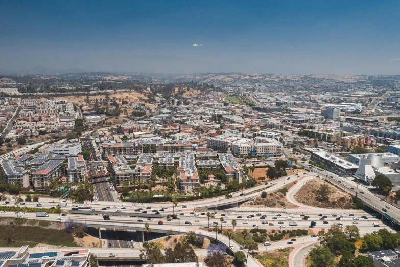 an aerial view of a city with lots of traffic, unsplash, gardena architecture, gigapixel photo, stacked image, panoramic