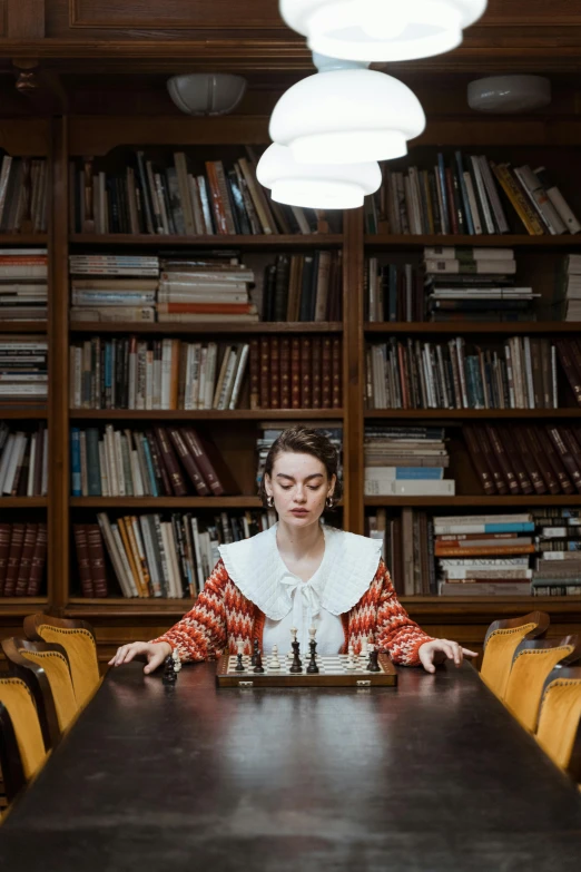 a woman playing a game of chess in a library, a portrait, by Anna Haifisch, unsplash, synthetism, natalia dyer, inspired in balthus, full frame image, centered in portrait