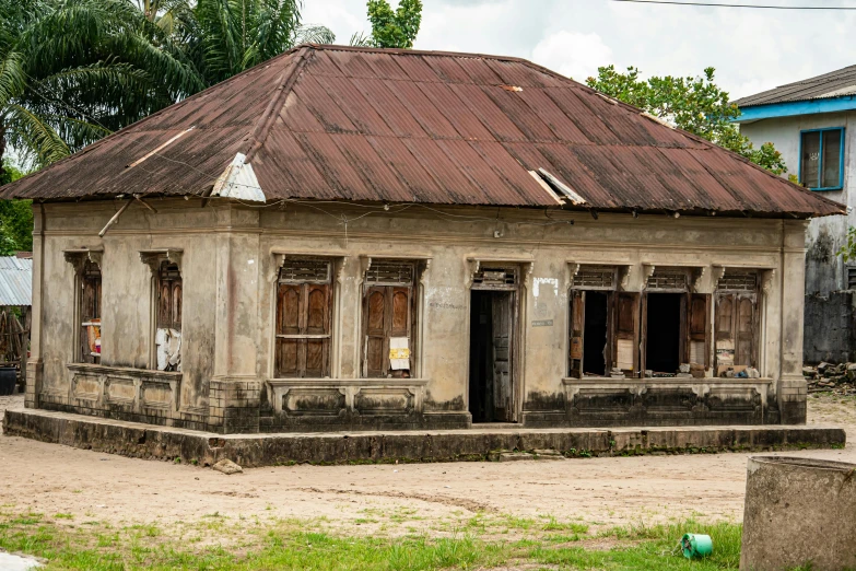 an old run down building with a rusted roof, renaissance, muzinabu, thumbnail, several cottages, nuri iyem