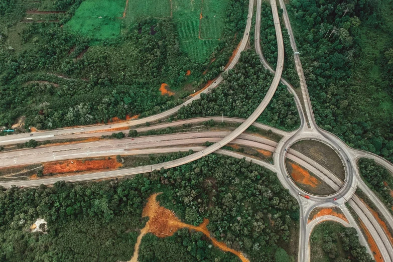 a couple of roads that are next to each other, by Adam Marczyński, pexels contest winner, hurufiyya, the infrastructure of humanity, sri lanka, hyperdetailed!, 70s photo