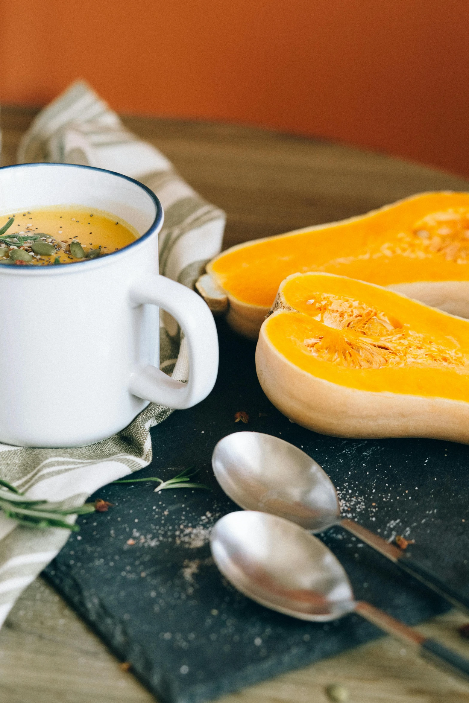 a bowl of soup sitting on top of a table, gourds, with a white mug, premium, thumbnail