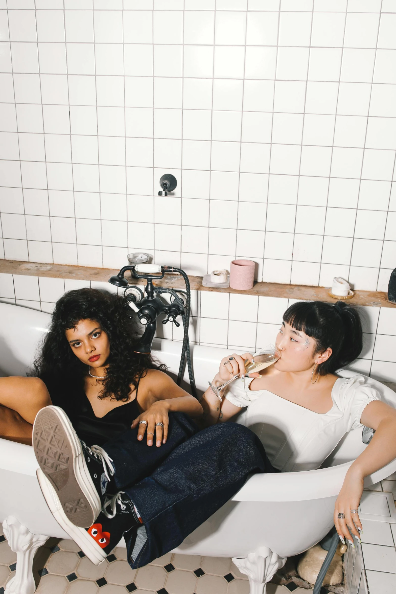 a couple of women sitting in a bath tub, trending on unsplash, sarah andersen, booze, cast, - 9