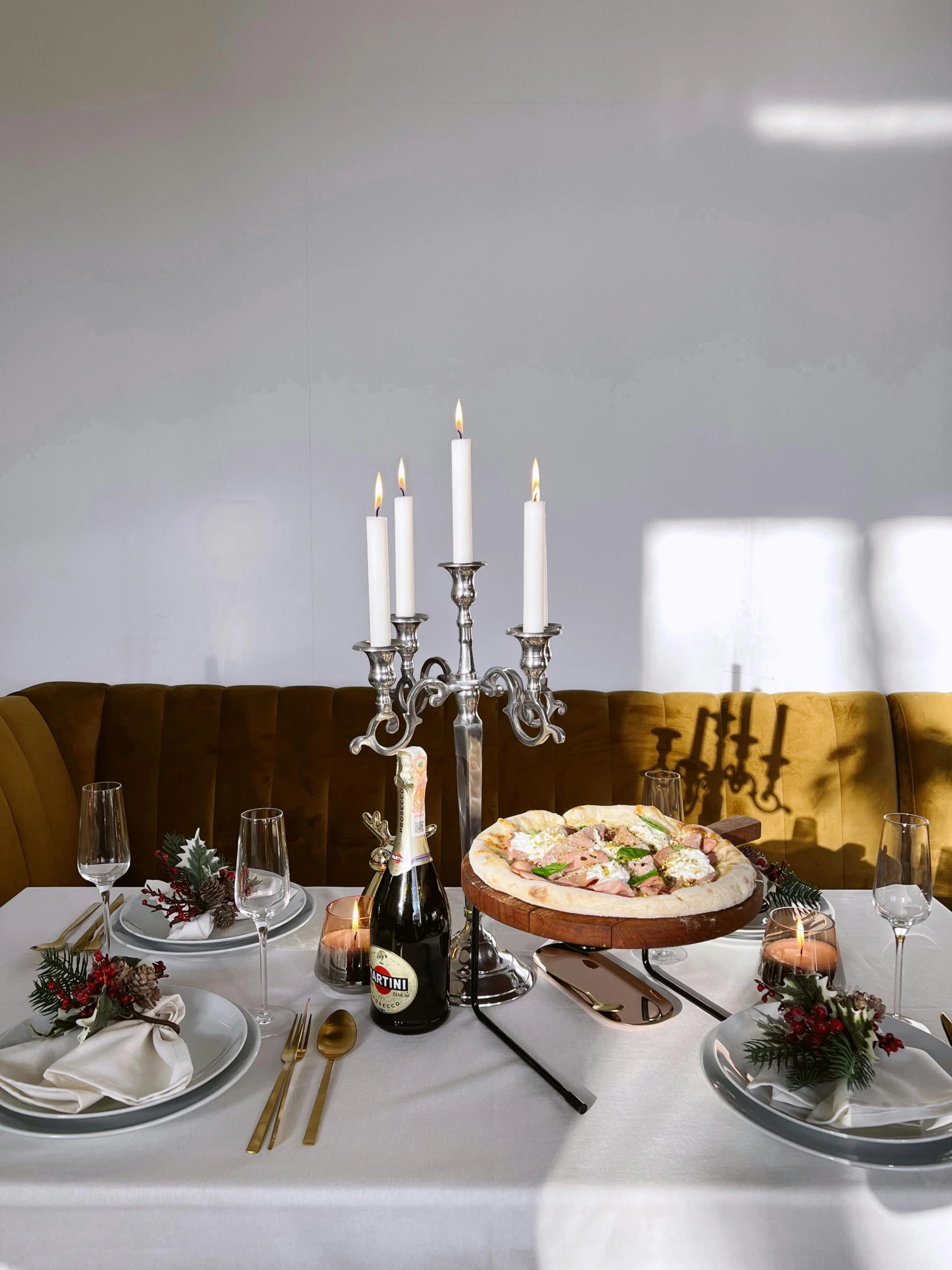 a table that has a cake on it, by Julia Pishtar, baroque, white candles, pizza on a table, silver，ivory, christmas