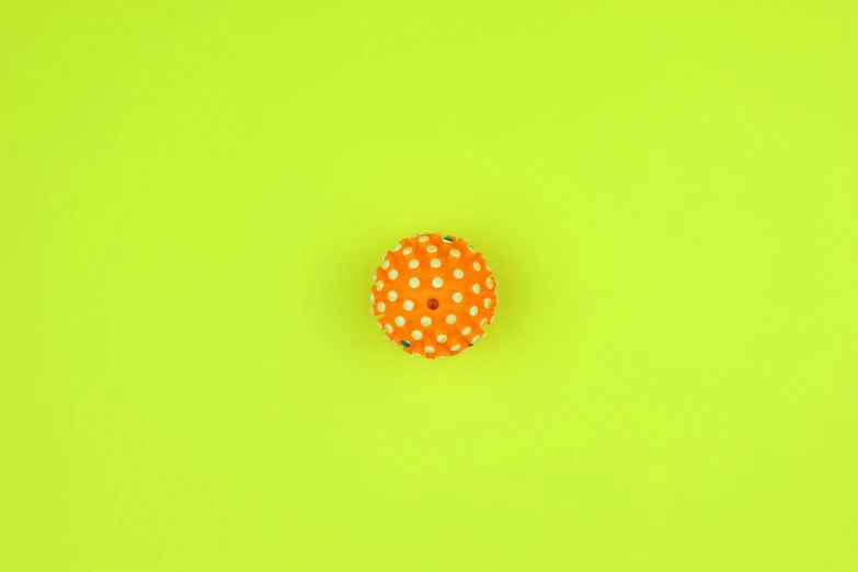 an orange and white polka dot dot dot dot dot dot dot dot dot dot dot dot dot, unsplash, conceptual art, tennis ball, with fluo colored details, levitating agricultural sphere, solid background color