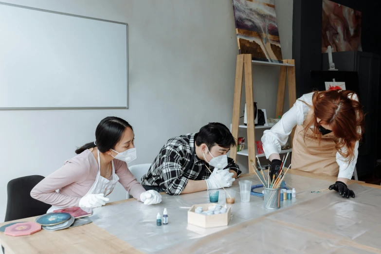 a group of people that are sitting at a table, a hyperrealistic painting, trending on pexels, academic art, pour cell painting, crafts and souvenirs, bangkuart, profile image