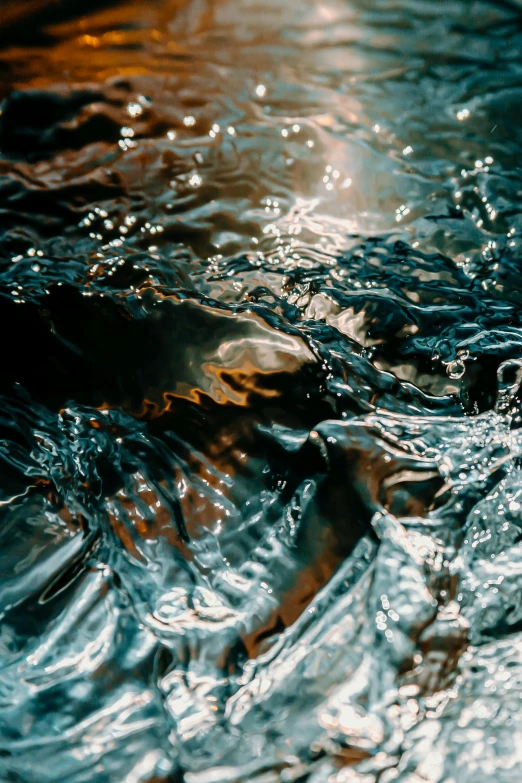 a close up of a body of water, inspired by Elsa Bleda, unsplash contest winner, lyrical abstraction, high contrast hyperrealism 8k, filtered evening light, black water, glossy surface