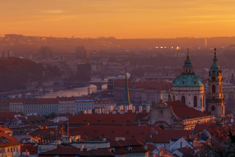 a view of a city from the top of a hill, by Adam Marczyński, pexels contest winner, art nouveau, sunset colors, prague, slide show, 4 k -