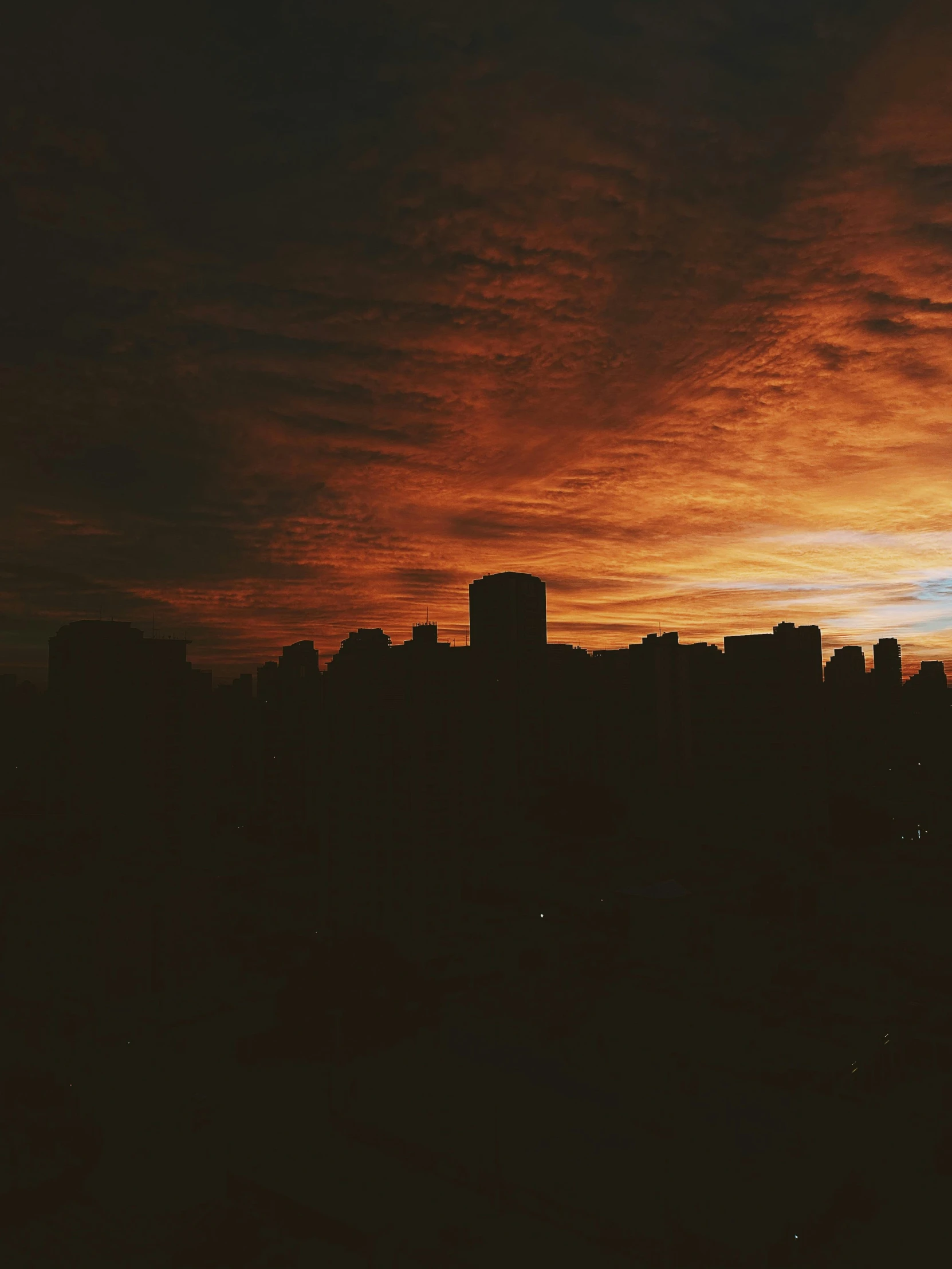 the sun is setting over the city skyline, a picture, inspired by Elsa Bleda, happening, trending on vsco, album cover, spooky photo, vancouver