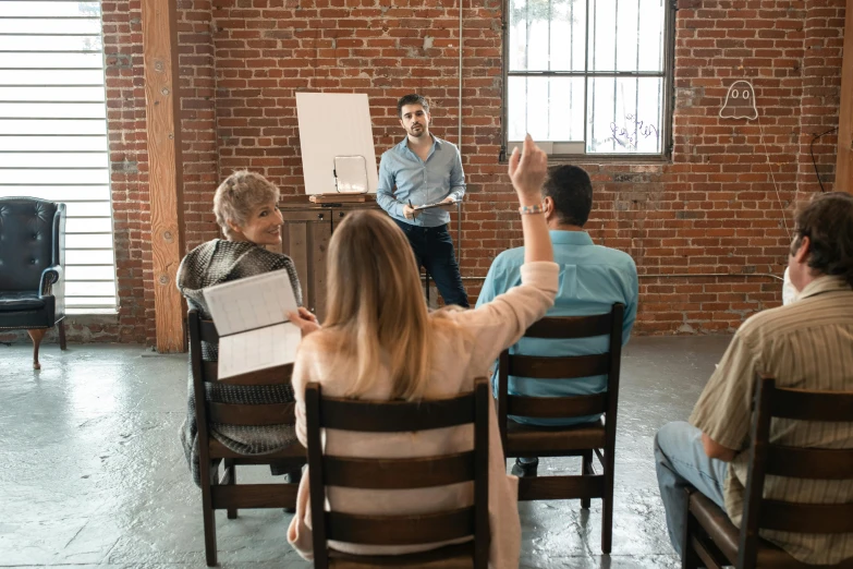 a man giving a presentation to a group of people, by Gavin Hamilton, pexels contest winner, renaissance, sitting down, 15081959 21121991 01012000 4k, upper body image, thumbnail