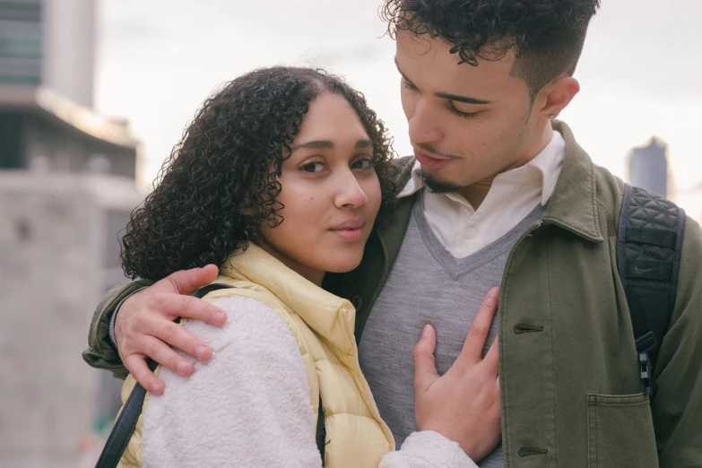 a man and a woman standing next to each other, trending on pexels, renaissance, comforting, teenage boy, mixed race, promotional image